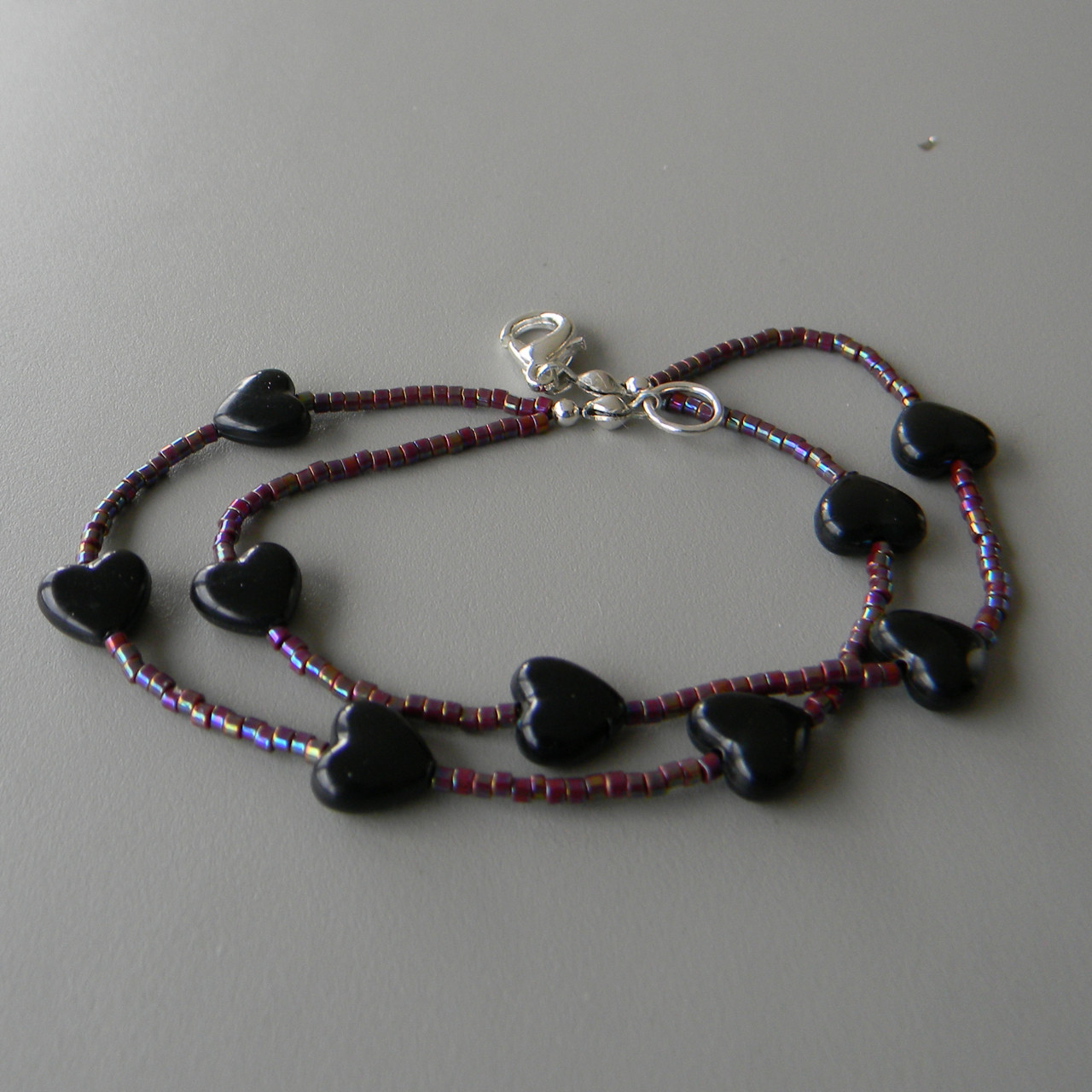 Black Heart Double-Strand Bracelet with Small Violet Irridescent Beads