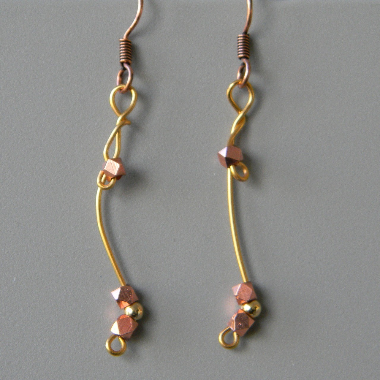 Curved Gold Wire Earrings with Copper Beads