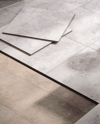 Close-up of removable dry-lay porcelain flooring modules