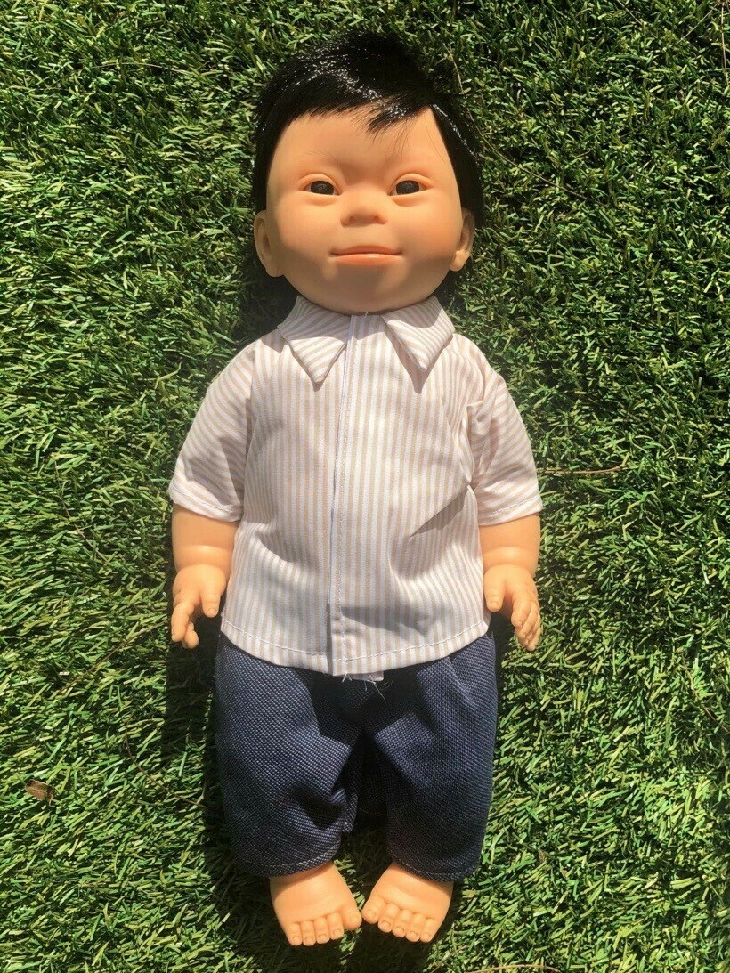 Doll with Down Syndrome facial features