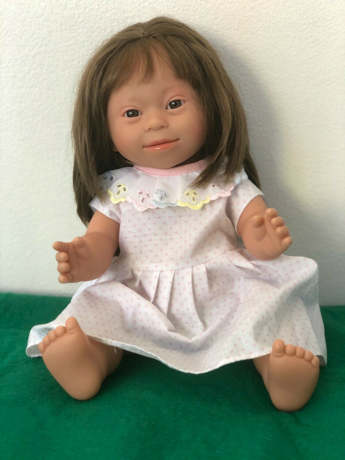 Doll with Down Syndrome facial features