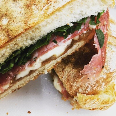 (Italian) Roasted red peppers, mozzarella, olive tapenade and rocket