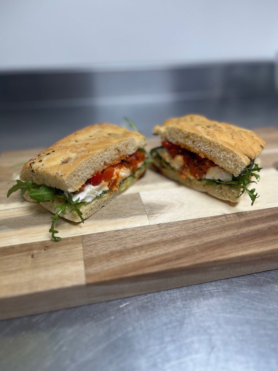 N'duja Sausage, Mozzarella, Tomato Salsa and Roquito Pearls