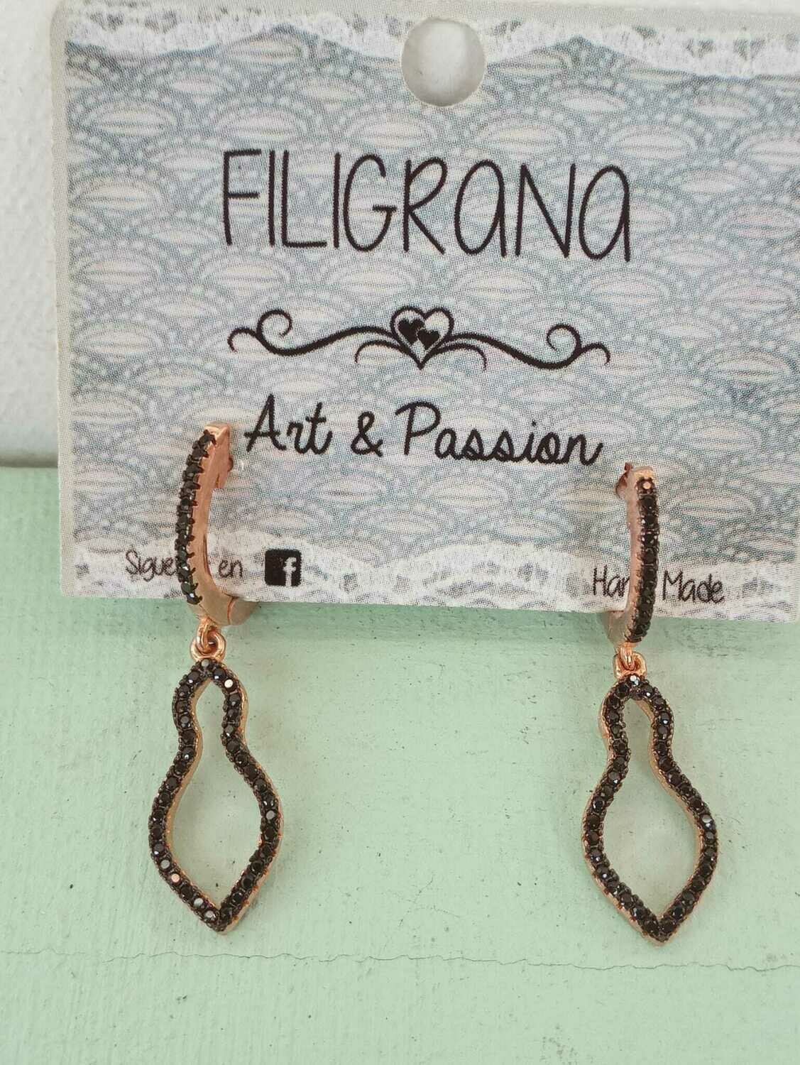 Colección Milan.  Pendientes en plata con baño en oro rosa y onix
