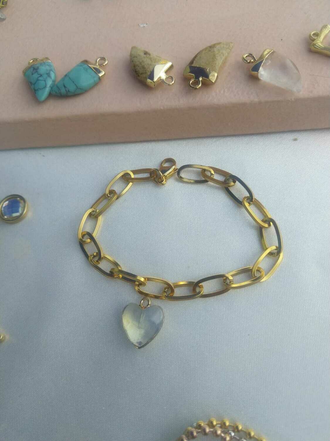 Chain. Acero con colgante corazón cristal roca
