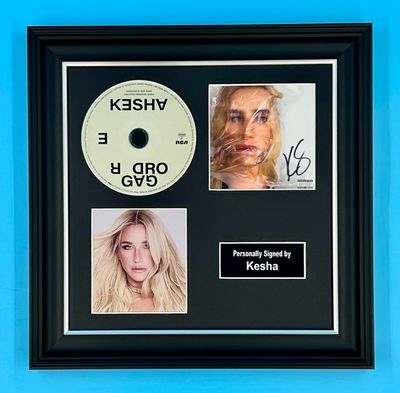 Kesha Signed Photo & CD In Luxury Handmade Wooden Frame & AFTAL Member Certificate Of Authenticity Gag Order Poster Music Memorabilia Autograph Auto