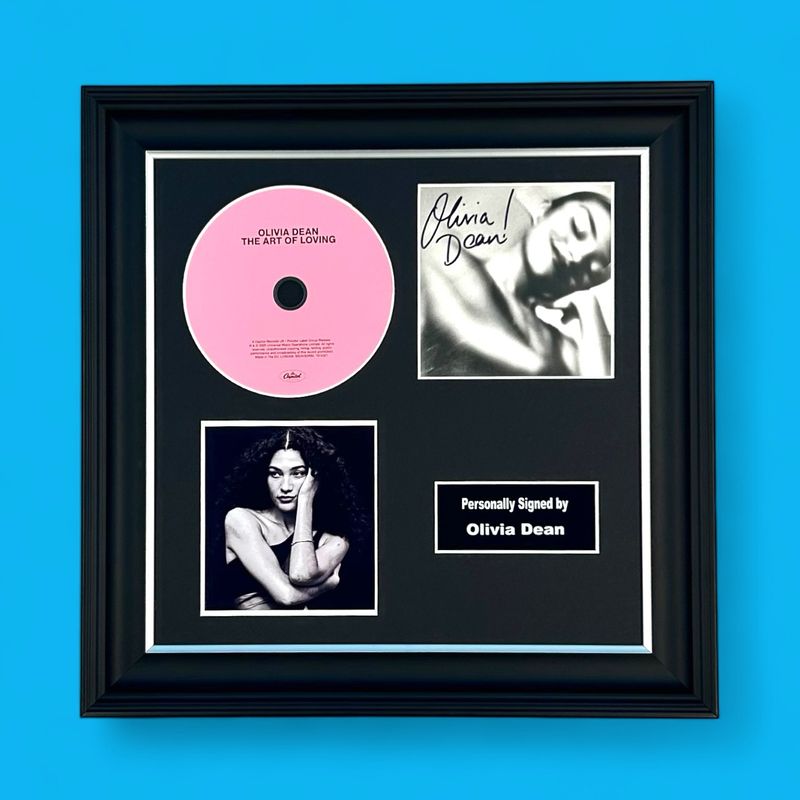 Olivia Dean Hand Signed “The Art of Loving” CD Photo Display In Luxury Handmade Wooden Frame & Certificate of Authenticity Autographed Music Memorabilia Poster Olivia Dean Hand Signed “The Art of Loving” CD Photo Display In Luxury Handmade Wooden Frame & Certificate of Authenticity Autographed Music Memorabilia Poster