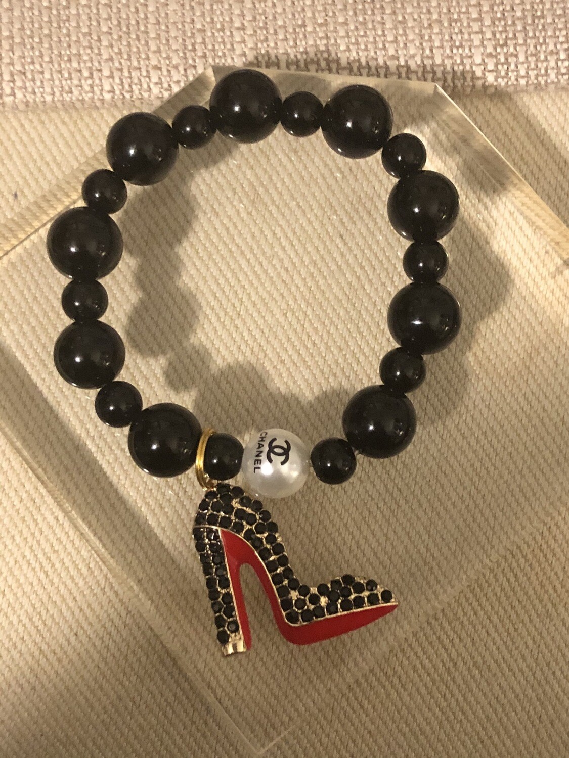 Designer Inspired Black Beaded Bracelets With Red Bottom Shoe