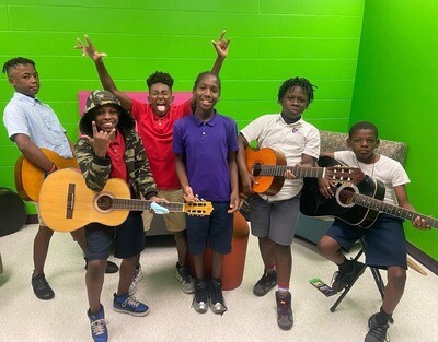 What do we do? We bring music lessons into our community centers.