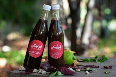 Molasse Pomegranate Sour دبس الرمان (Bottle) - Fertaike