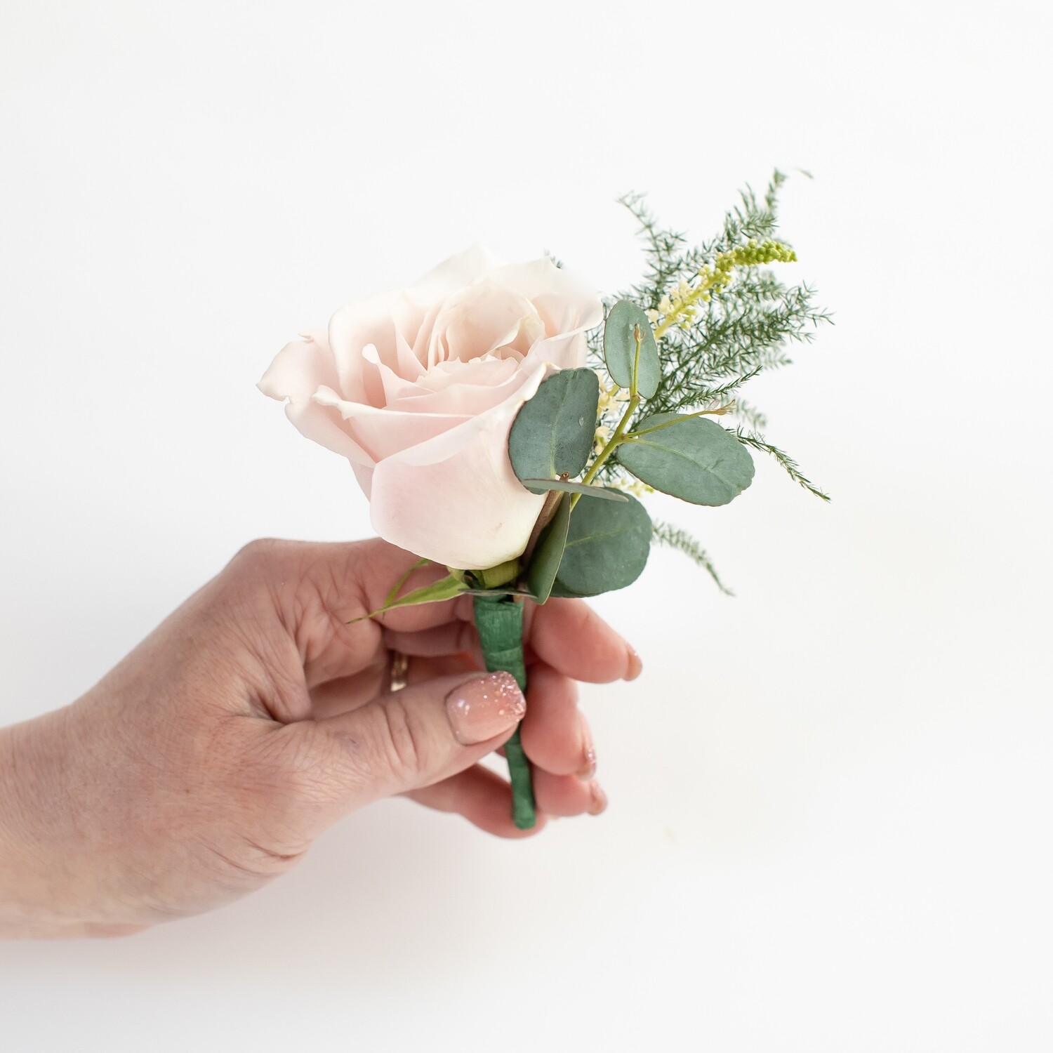 Blush rose boutonnière