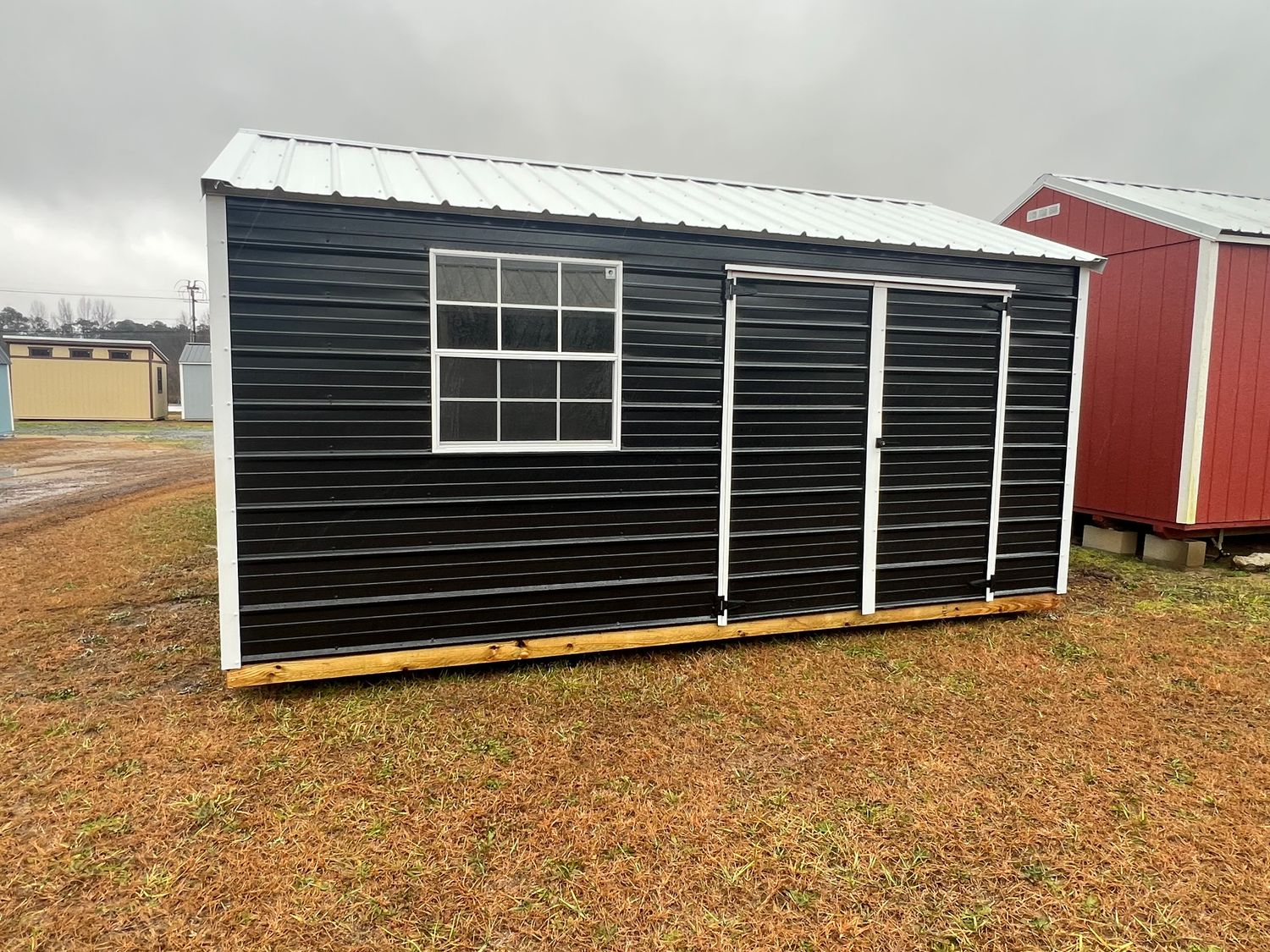 10x16 Metal Utility W/ Garage Door