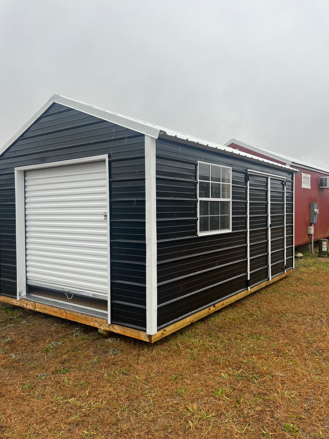 10x16 Metal Utility W/ Garage Door