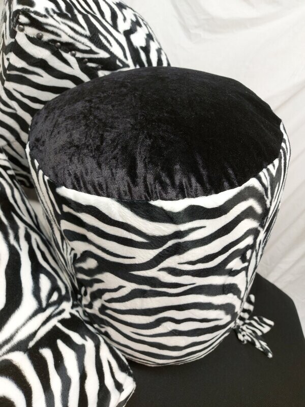 Cylinder shaped zebra pouffe