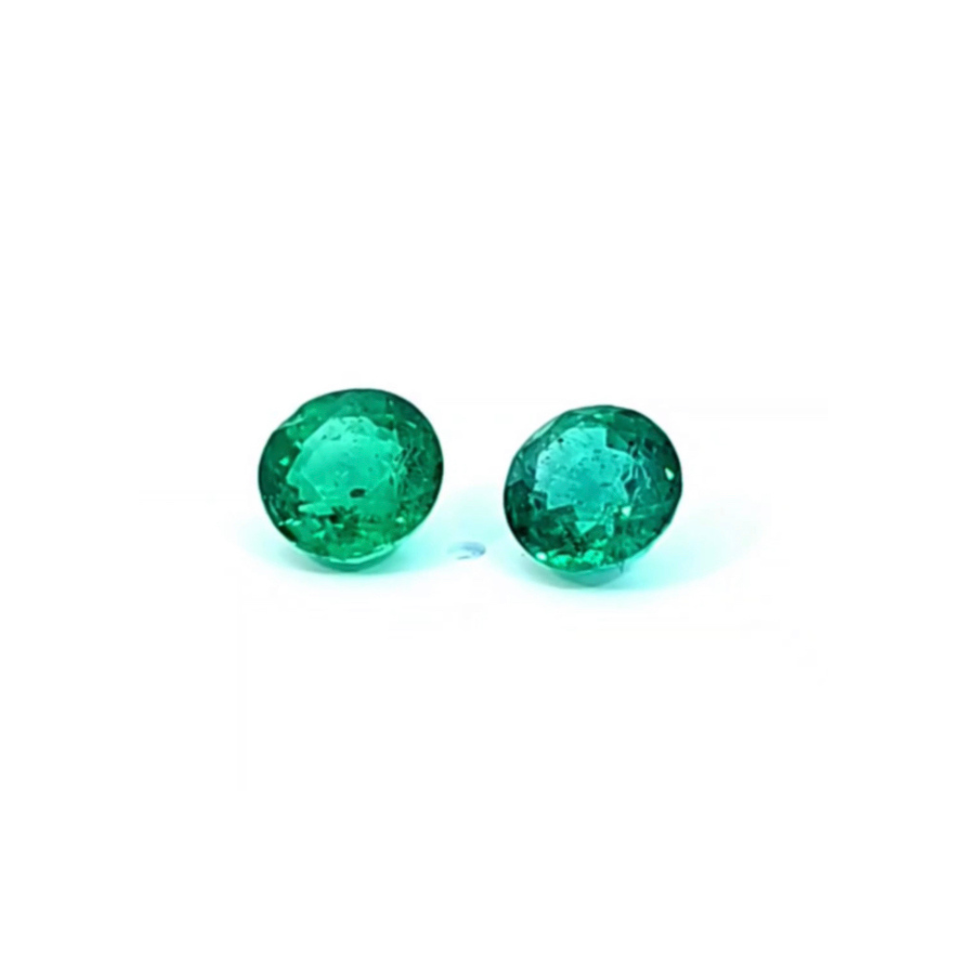 1.50 ct and 1.76 ct Emerald round cut pair