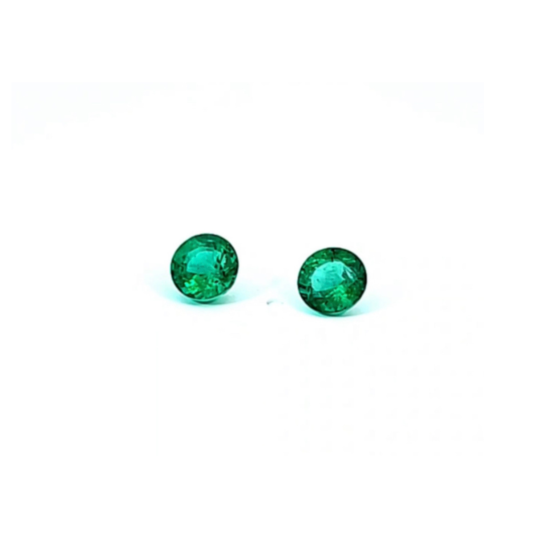0.76 ct and 0.91 ct Emerald round cut pair
