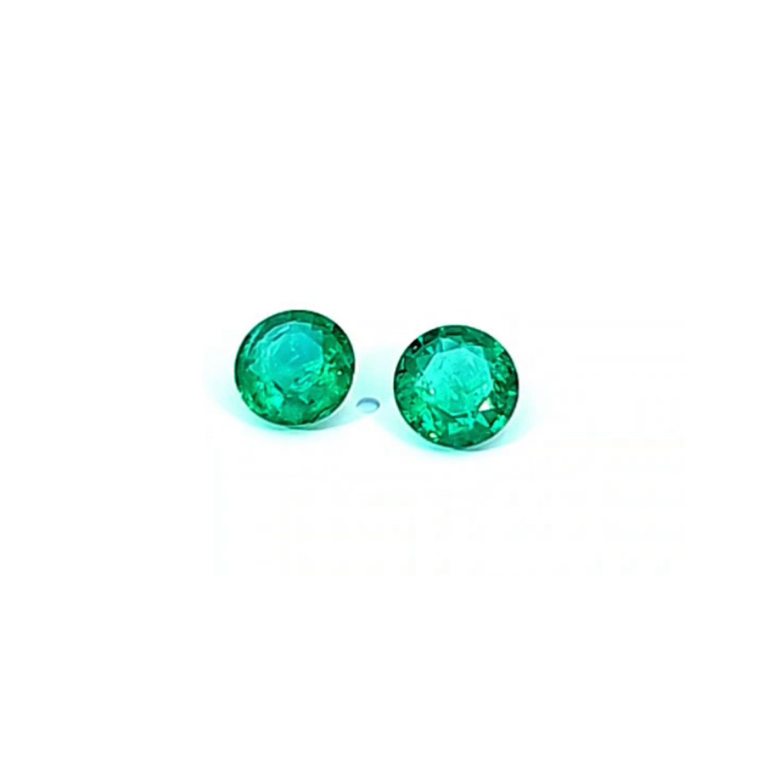 1.47 ct and 1.60 ct Emerald Round cut pair