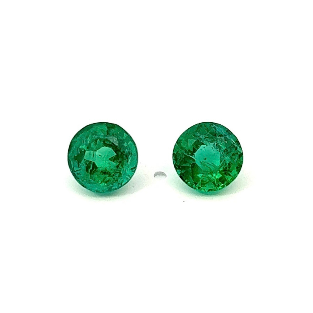 2.64 ct and 2.31 ct Emerald round cut pair