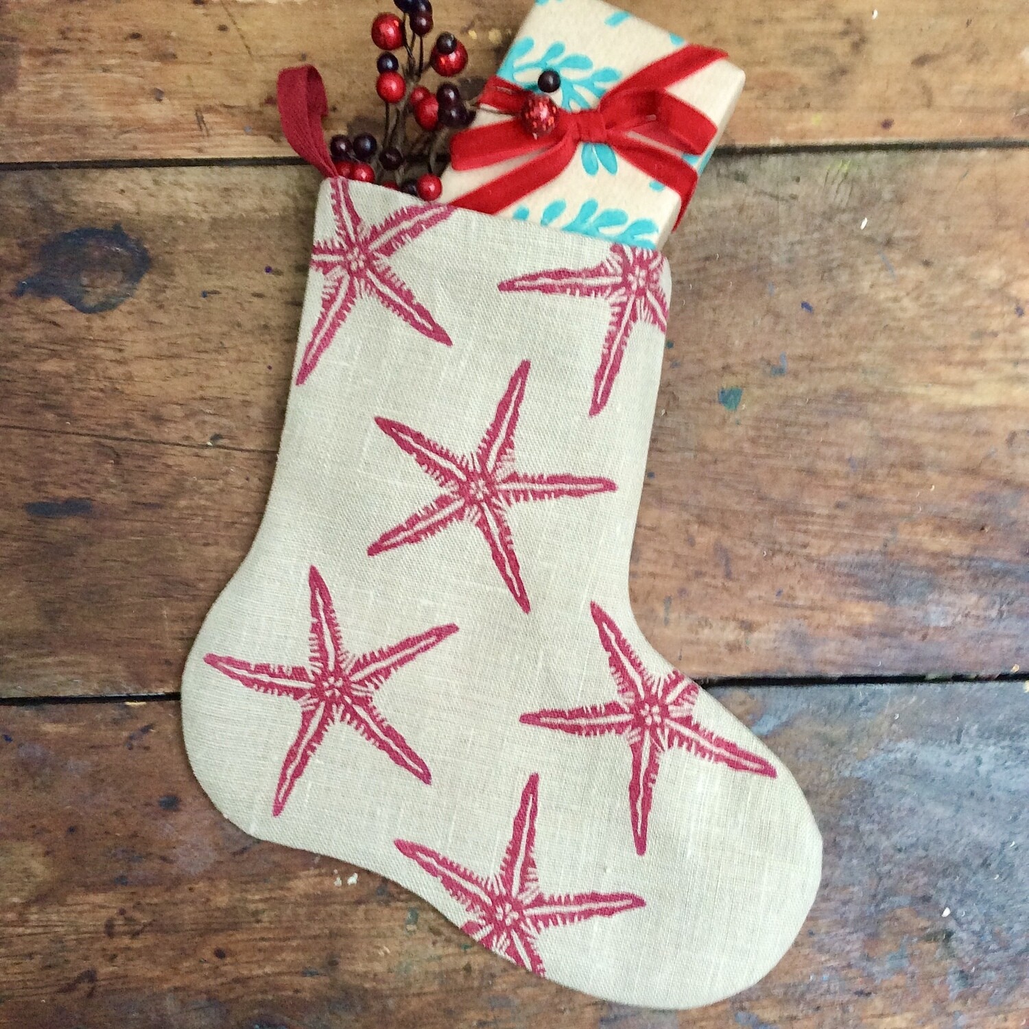 Christmas Bootees - Starfish 
Mulberry on rustic linen