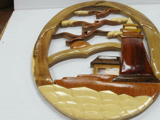 AN LIGHT HOUSE INTARSIA WALL HANGER