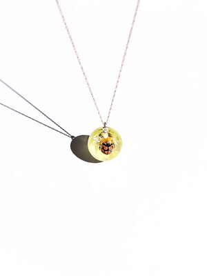 Small Ladybird on a Soft Yellow Sewejaartjie Globe Necklace