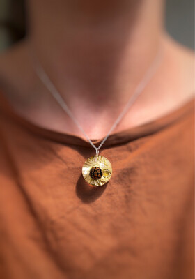 Ladybird on a Sewejaartjie Garden Globe Necklace