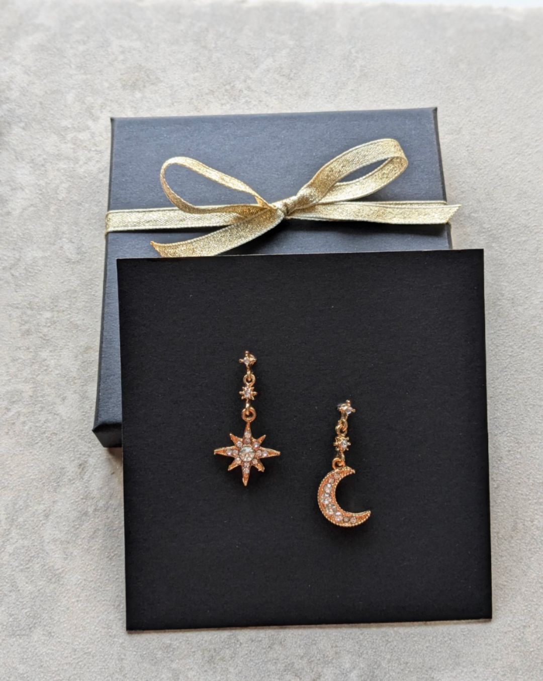 Star and moon drop earrings