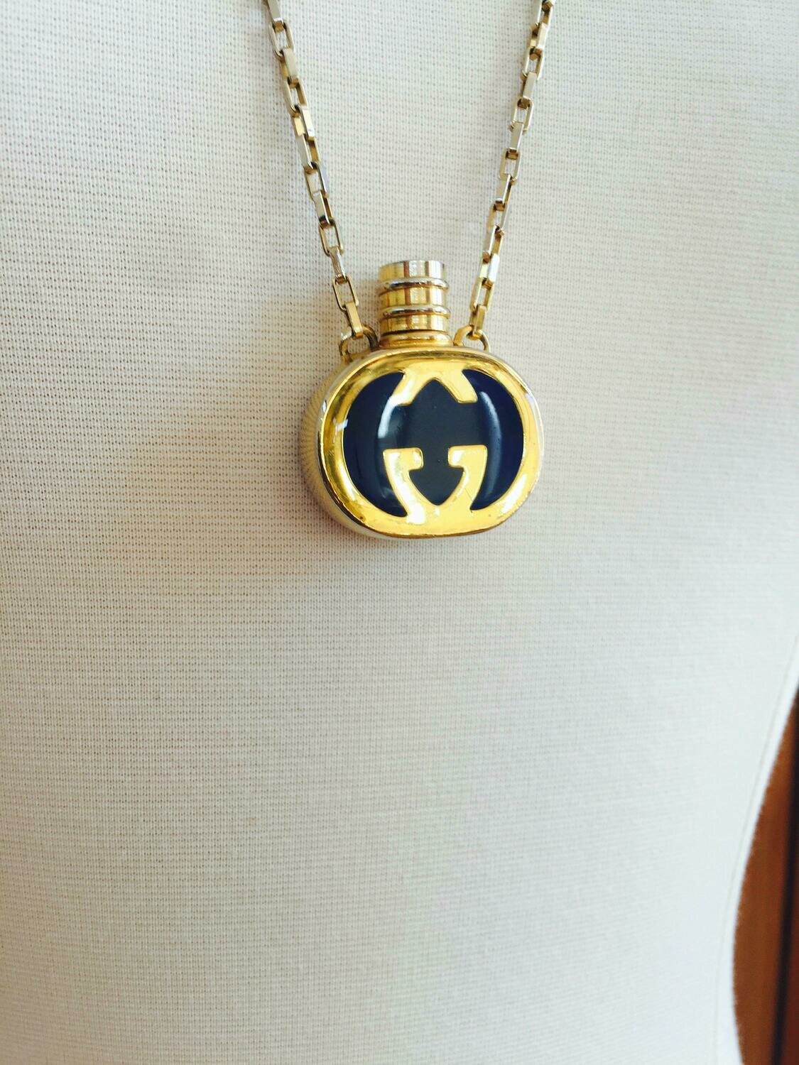 Gucci hotsell gold charm