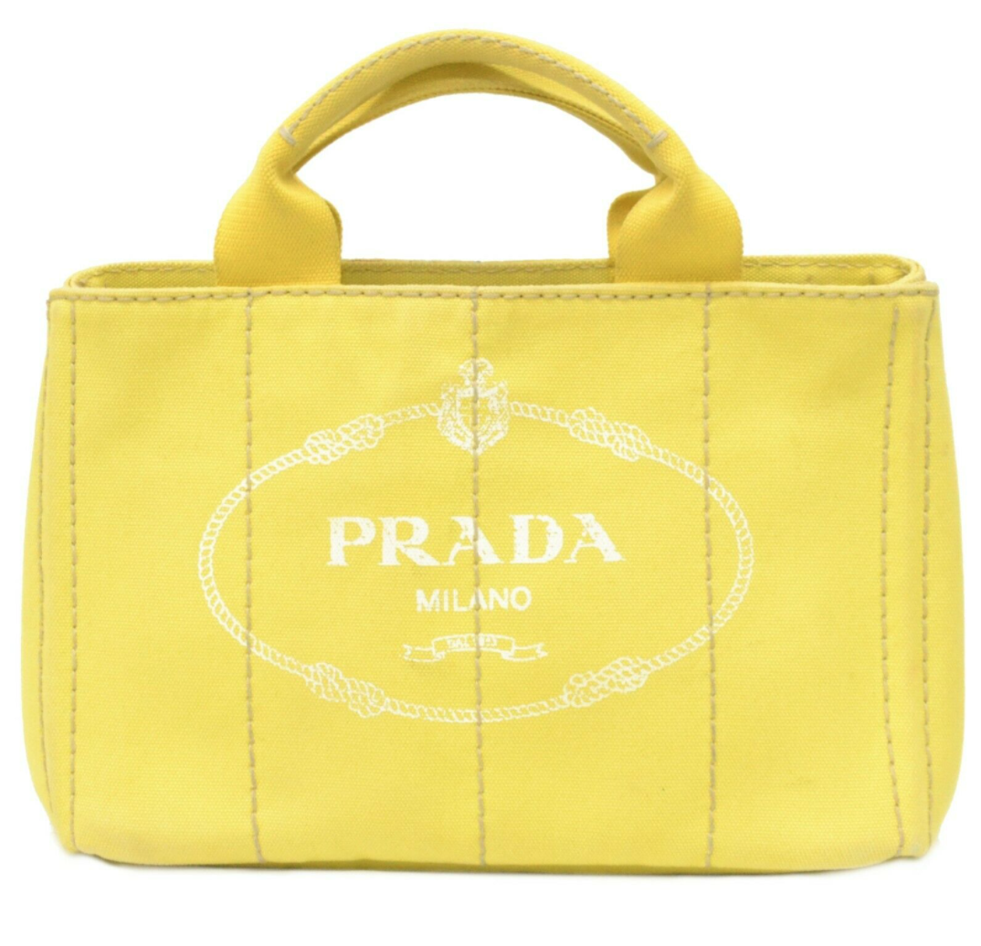 PRADA Yellow Bags & Handbags for Women