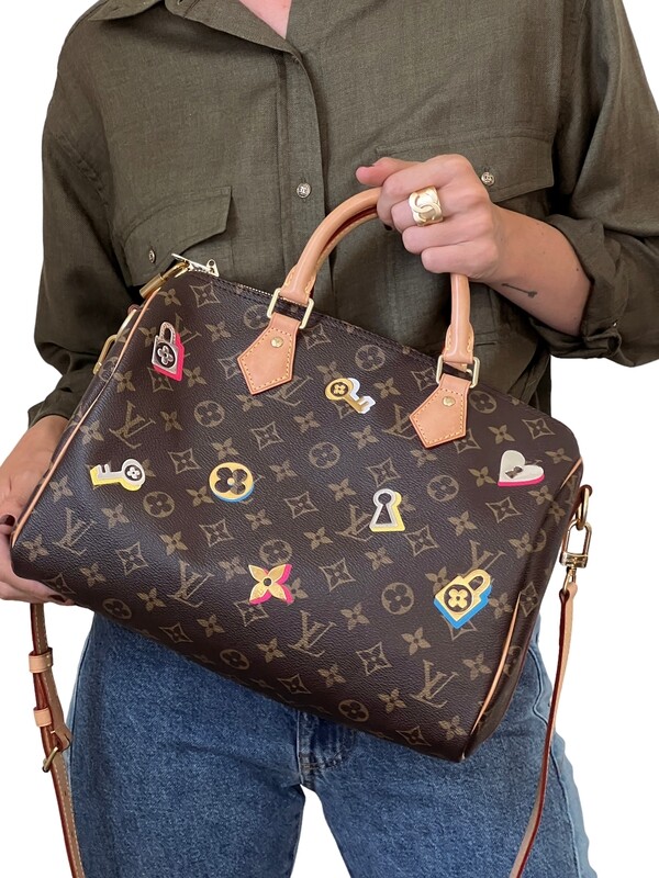 LOUIS VUITTON MONOGRAM LOVE LOCK SPEEDY BANDOULIERE 30 BAG