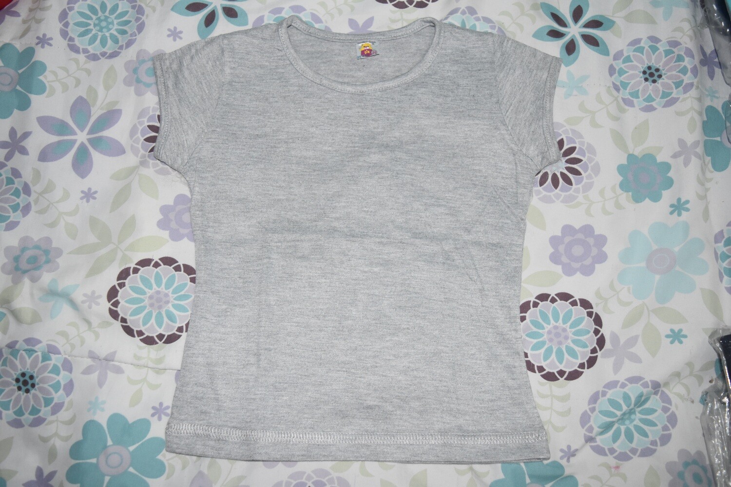 CAMISETA NIÑA 1 COLOR por mayor $2,25