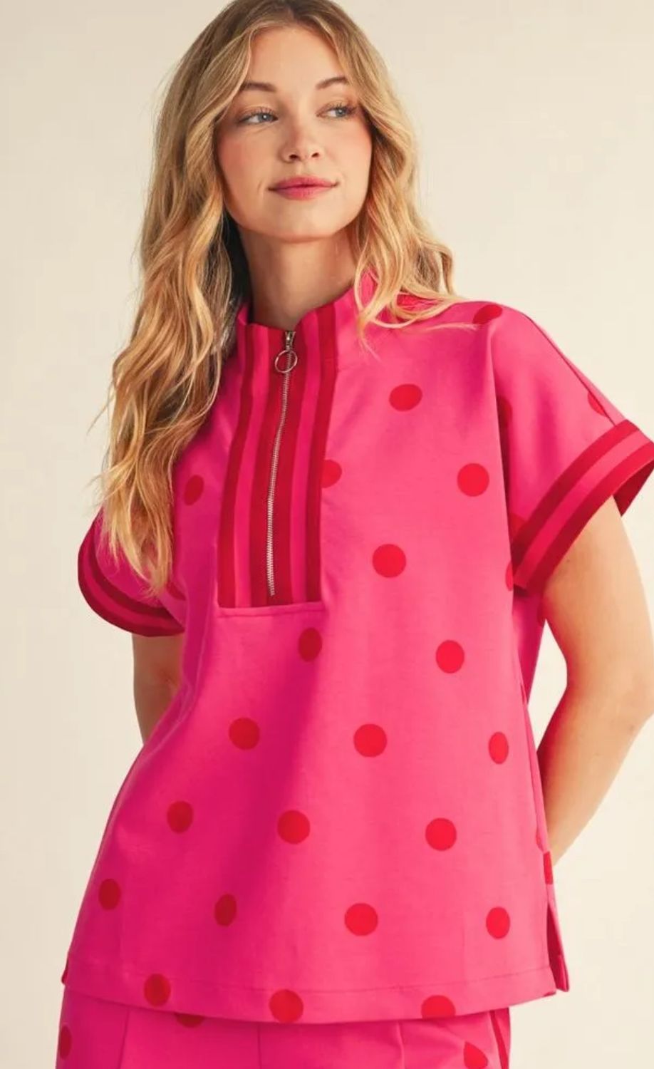 Drop shoulder front zip up polka dot top
