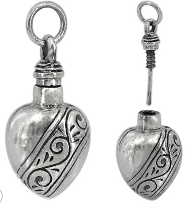 Sterling silver bottle pendant. Approx size: 21mm x 12mm