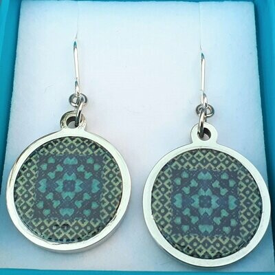 Round stainless steel earrings with walnut inlay