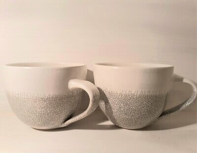A Set of Two Very Large Stoneware Cups
