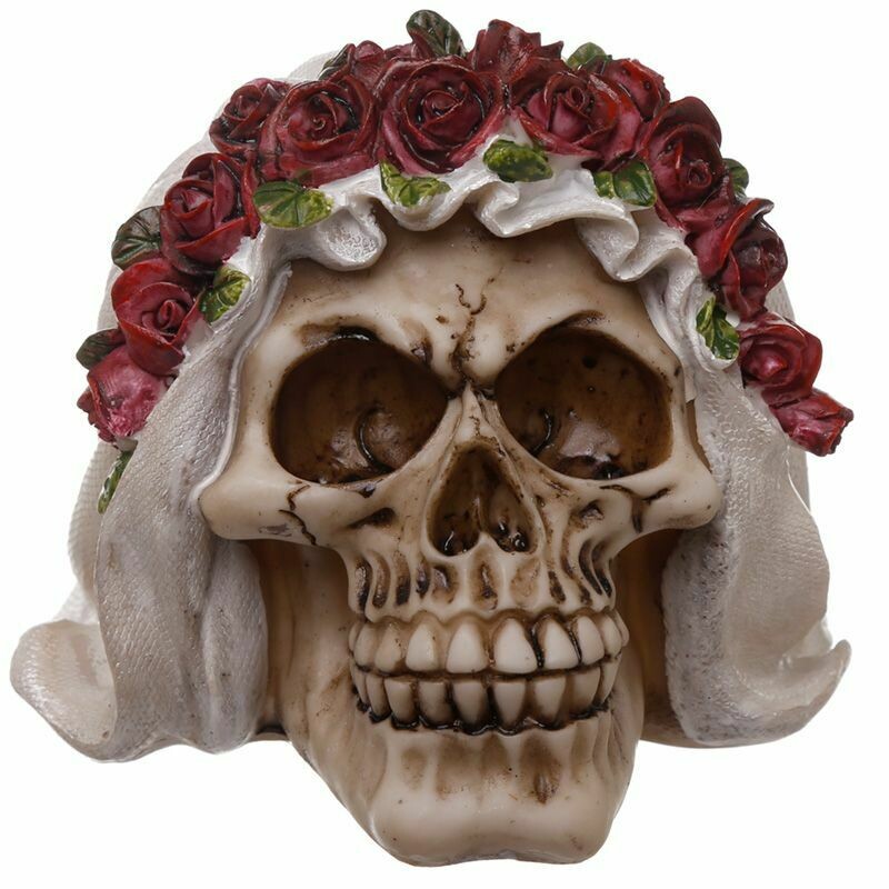 Crâne de jeune mariée avec rose