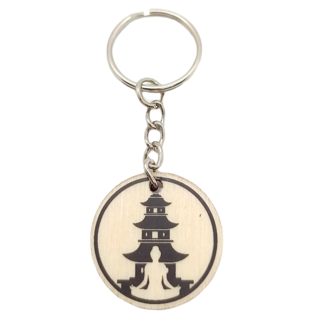 Porte-clés en bois verni - Bouddha devant temple