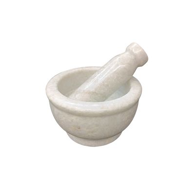 Mortier et pilon en marbre blanc