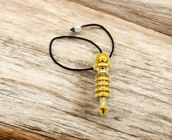 ​Pendule Isis en laiton