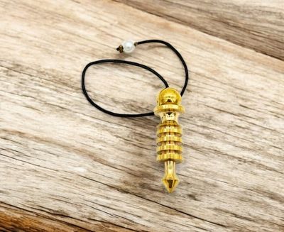 ​Pendule Isis en laiton