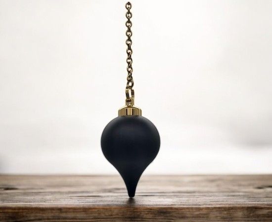 Pendule en bois d'ébène