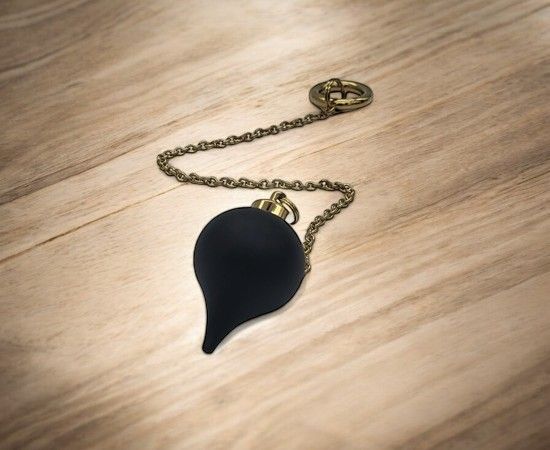 Pendule en bois d'ébène
