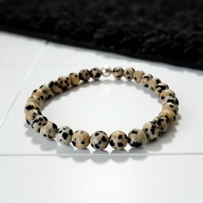 Bracelet jaspe dalmatien 6mm - énergie protectrice et équilibrante tout au long de la journée.