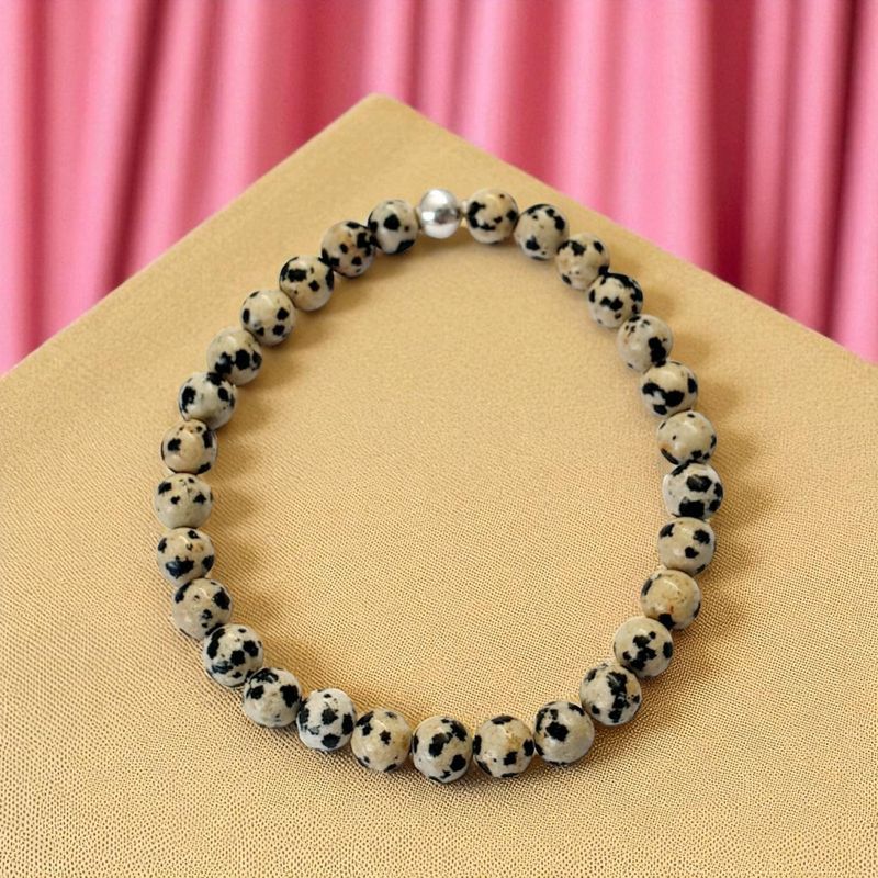 Bracelet jaspe dalmatien 6mm Bracelet jaspe dalmatien 6mm - énergie protectrice et équilibrante tout au long de la journée.