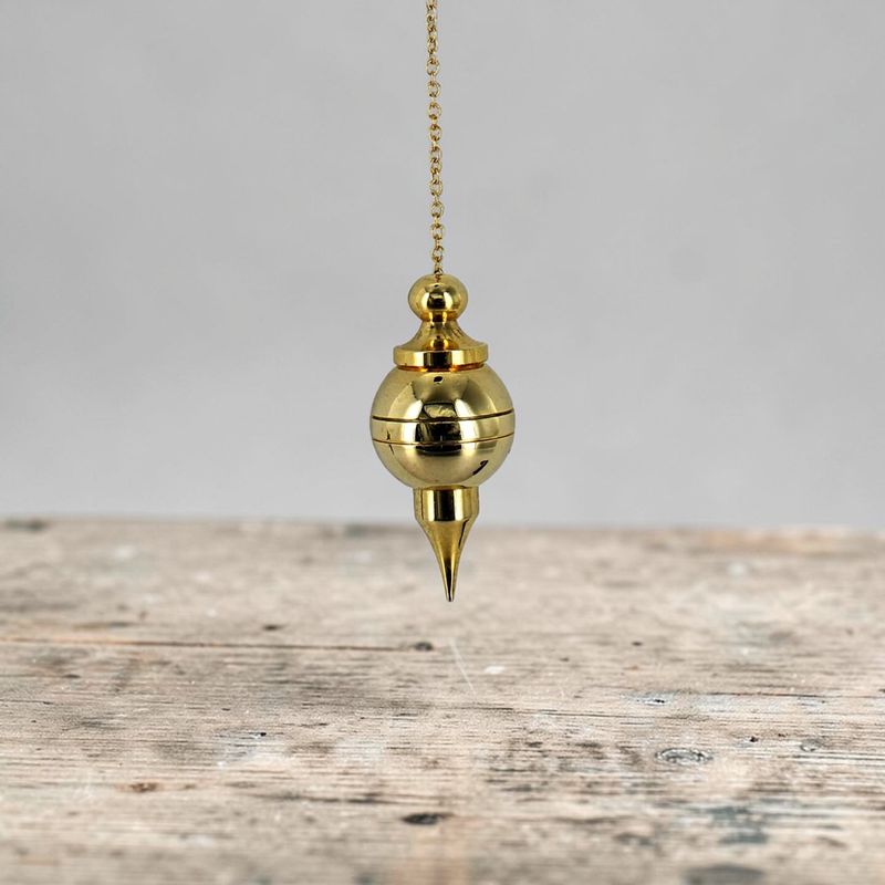 Pendule séphoroton aiguille doré