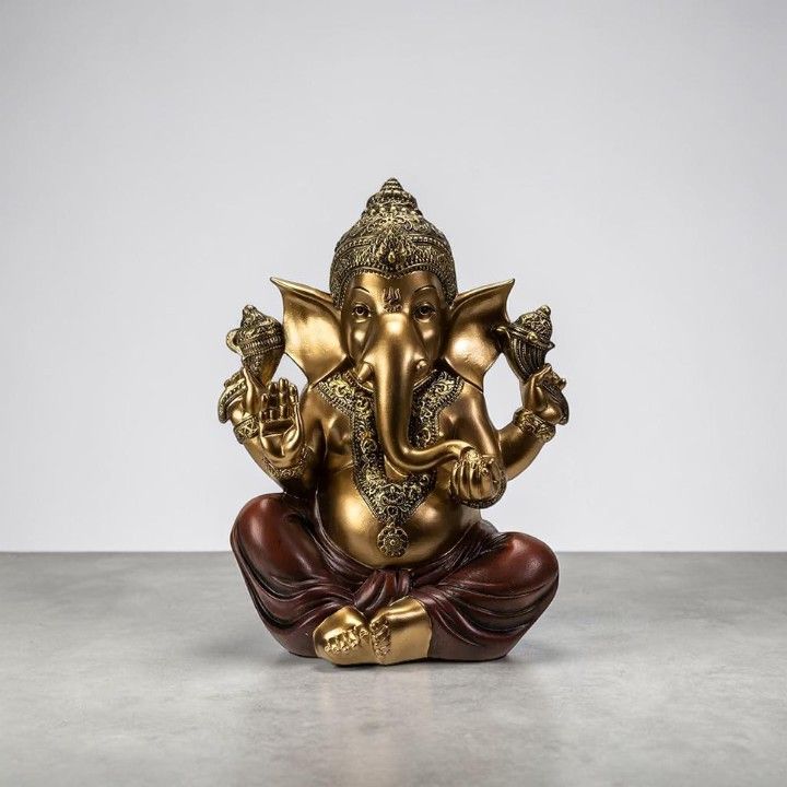 Statue de Ganesh hindou assis or et rouge - 28 cm