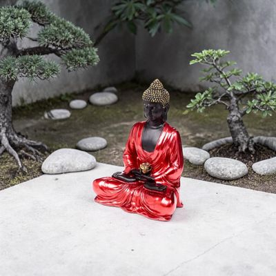 Bouddha thaï méditant rouge, noir et doré lotus