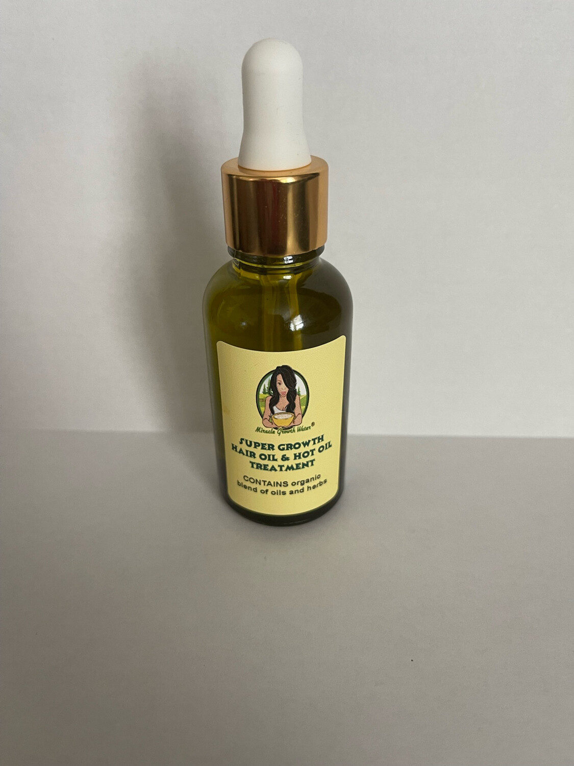 Super Growth Hair Oil & Hot Oil Treatment 2oz. Bottle