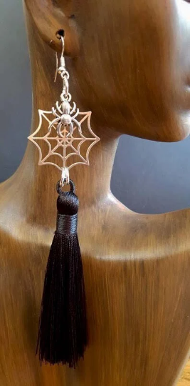Black tassels with spiders