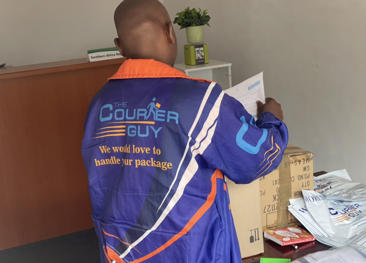 Courier Guy collecting parcels at David Jones Southern Africa Reception 19 December 2022